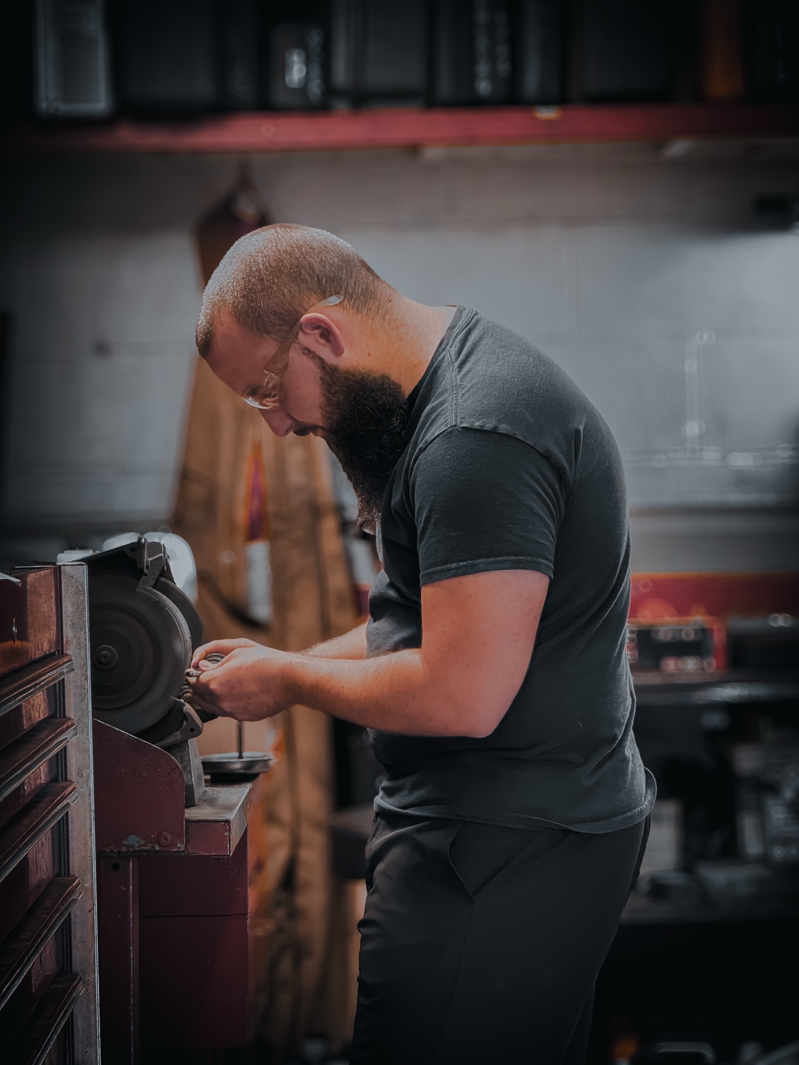 Brandon working at the shop